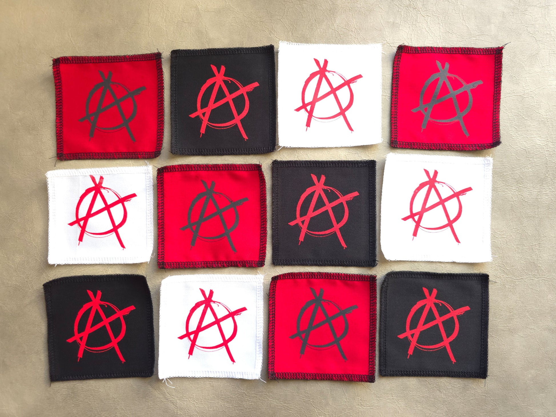 Handmade screen printed anarchy symbol patch available in multiple color options