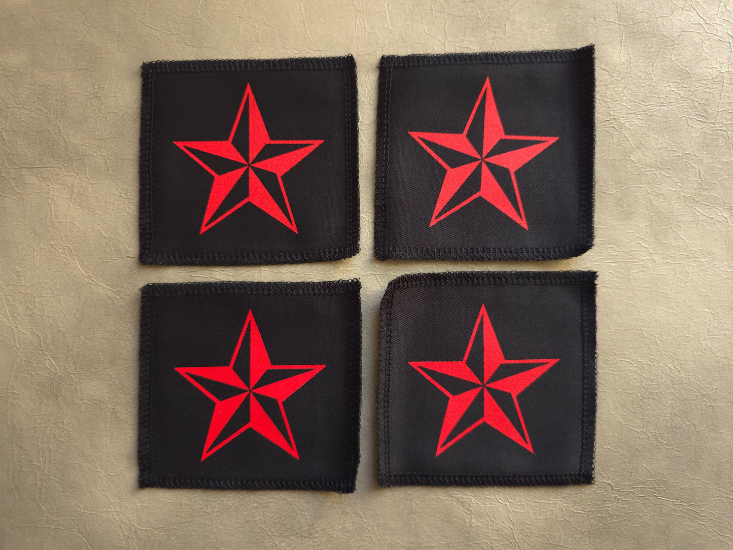 handmade screen printed black patches with red punk rock stars 