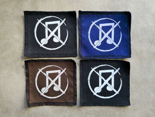 Handmade screen printed noise not music symbol patch, front view showing detailed ink design on fabric