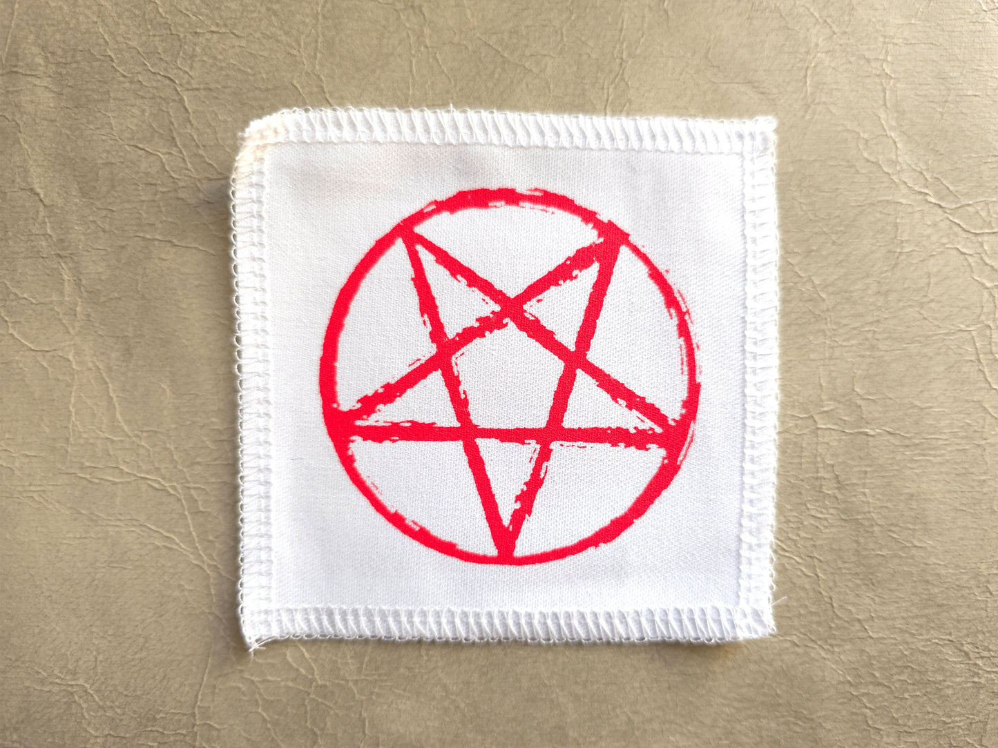 handmade screen printed White patch with red pentagram symbol