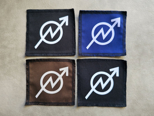 Handmade screen printed squat symbol patch, front view showing detailed ink design on fabric