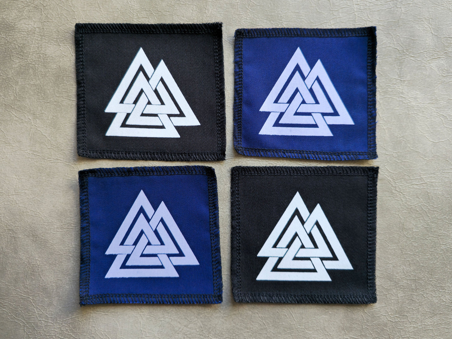 Handmade screen printed valknut symbol patch, front view showing detailed ink design on fabric