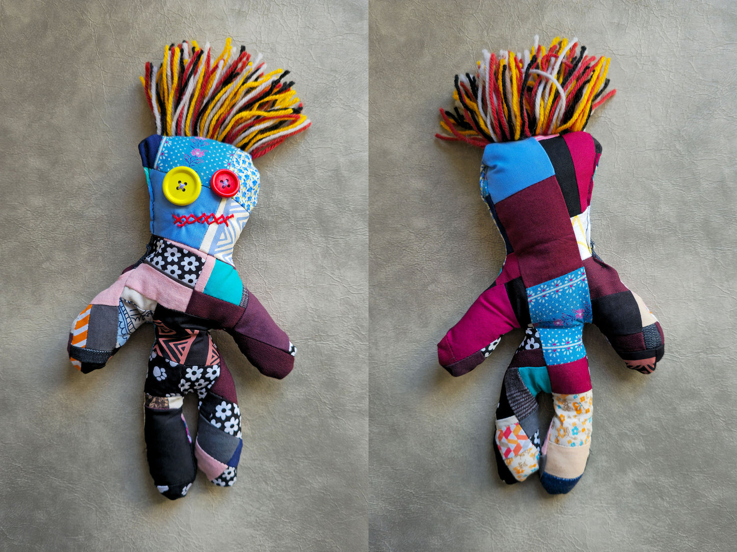 colorful voodoo doll, front and back view, patchwork dolls with unique hairstyles on a gray background